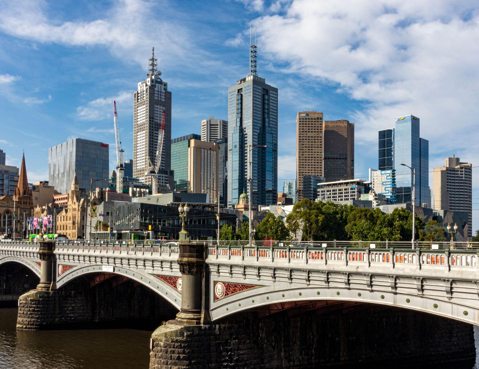 Modern Melbourne Skyscrapers Next to the Neo Gothic Cathedral and 19th Century Princes Bridge